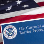 U.S. Customs and Border Protection logo and American flag