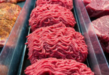 Ground beef on display at a butcher shop.