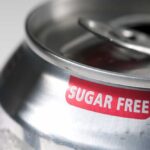 Diet Soda SCANDAL — Awful Disease Link Close-up of a soda can with a sugar free label