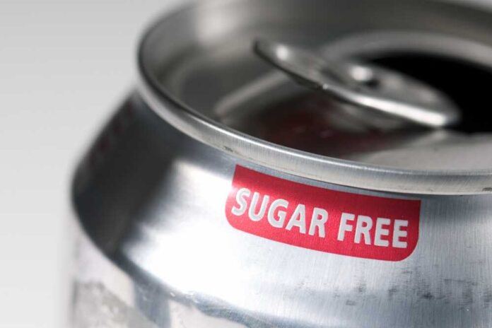 Close-up of a soda can with a sugar free label