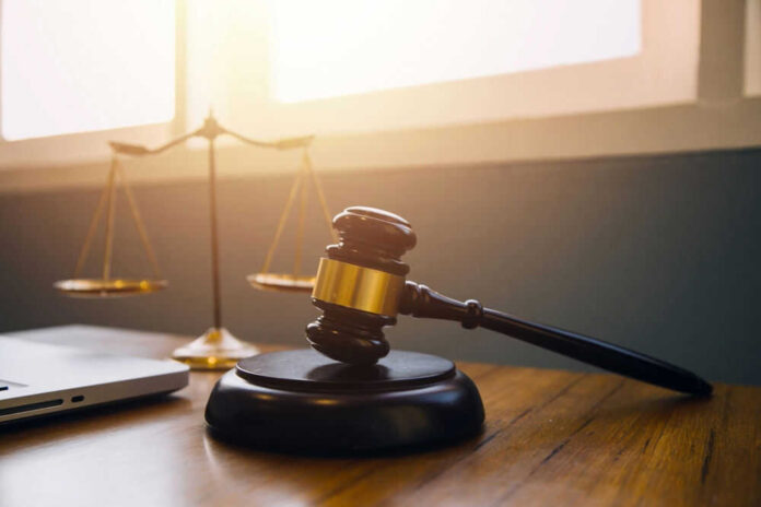 Gavel and scales of justice on desk