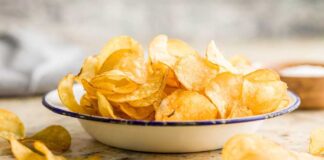 A bowl filled with golden, crispy potato chips