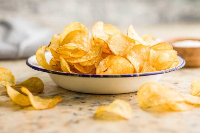 A bowl filled with golden, crispy potato chips