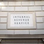 Sign displaying 'Internal Revenue Service' on a government building
