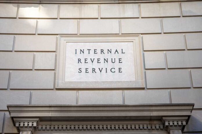 Sign displaying 'Internal Revenue Service' on a government building