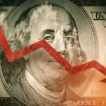 Red downward arrow over Benjamin Franklin on US dollar.