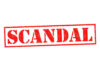 Red stamp with the word scandal