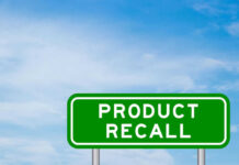Hidden Danger: Massive Recall Sparks Fire Fears Green sign with product recall text and sky background