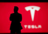 HUGE CHANGE: Tesla Axes Flagship Cars Silhouette with Tesla logo in red background.