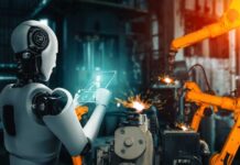 AI Targets Office Jobs: A Shocking Shift A humanoid robot using a tablet in an industrial setting with robotic arms in action
