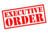 Red stamp reading executive order