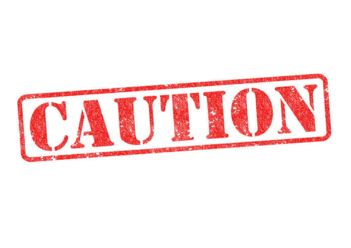 shutterstock127902668jpg Red caution sign with grunge texture diagonal