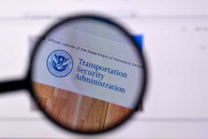 Magnifying glass focusing on the Transportation Security Administration website