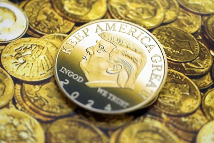 shutterstock_2722881281.jpg Gold coin featuring a profile of a political figure with the slogan 'Keep America Great'