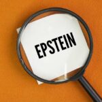 Magnifying glass over a piece of paper with the word 'EPSTEIN'