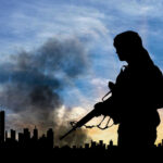 Silhouetted soldier with rifle, smoky cityscape background.
