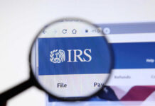 IRS AI Audit Machine Targets Retirees Magnifying glass focusing on IRS website logo.