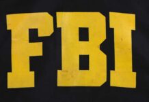 FBI logo displayed in large yellow letters on a black background