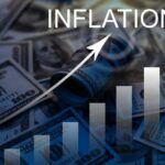 A visual representation of inflation with dollar bills and a rising graph