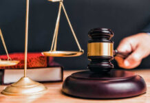 Judge Forces Ivy League Jewish Staff List Disclosed Judge gavel, scales of justice, and law books.