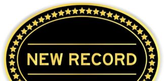 A badge displaying the text 'NEW RECORD' surrounded by gold stars