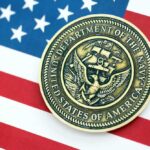 Navy medal placed on an American flag background