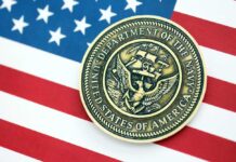 Navy medal placed on an American flag background