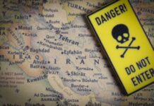 Iran’s New Target — Thousands at Risk A danger sign placed over a map of the Middle East