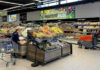 Grill Bill SHOCK: Memorial Day Costs Soar! People shopping and cleaning inside an Aldi supermarket.