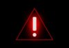 Red triangular warning sign with an exclamation mark