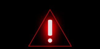 Red triangular warning sign with an exclamation mark