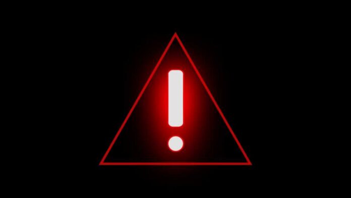 Red triangular warning sign with an exclamation mark