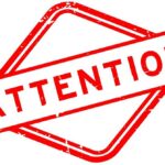 Bacterial Nightmare: Stunning Dog Food Recall Red attention sign with the word 'ATTENTION' in bold letters