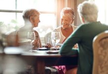 Dance Revolutionizes Senior Fitness Group of senior women enjoying a meal and conversation at a table