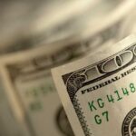 Trump Drops IRS Suit: Shocking $1.8B Fund Emerges Close-up of a stack of hundred dollar bills