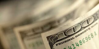 Close-up of a stack of hundred dollar bills