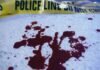 Gunfire Near White House – 1 Dead; 1 Wounded Blood stains on a surface with police caution tape in the background