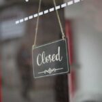 177-Year Beer Legacy PAUSED…But Is It Gone for Good? A closed sign hanging on a shop window