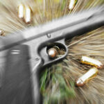 Liberal City CHAOS: Teens, Gun, and Cops Hit Pistol and bullets on grass with motion blur effect.