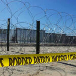 Border Blitz: $70B Push Stuns Democrats Border patrol tape and barbed wire fence.