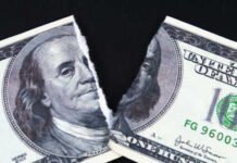 War Shock Hits Wallets And Mortgages A torn hundred dollar bill featuring Benjamin Franklin