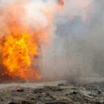 A large explosion with flames and smoke.