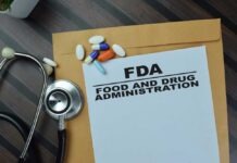 Food Recall EXPLODES — 41 States Hit FDA document with pills and a stethoscope on a wooden surface