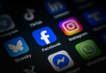 Facebook User Payout Checks Return — But With a Catch Close-up of various social media application icons on a smartphone screen
