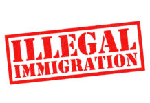 Massive Waves of Communist Illegals Hit Border? Red illegal immigration stamp on white background