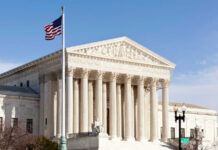 Supreme Court Smacks Down DC Overreach U.S. Supreme Court building with American flag.