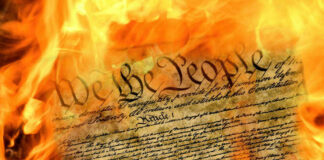 Burning U.S. Constitution amidst flames.