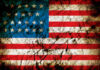 American flag with grunge texture and cracks