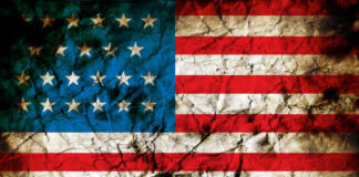 American flag with grunge texture and cracks