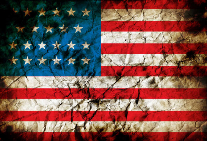 American flag with grunge texture and cracks
